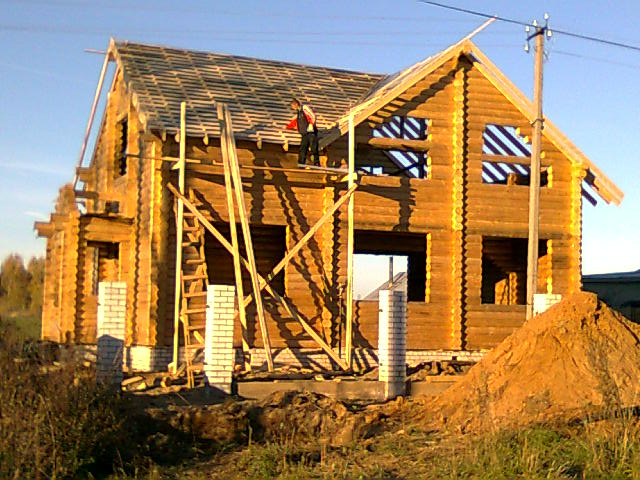 завершение строительства деревянного дома из оцилиндрованного бревна